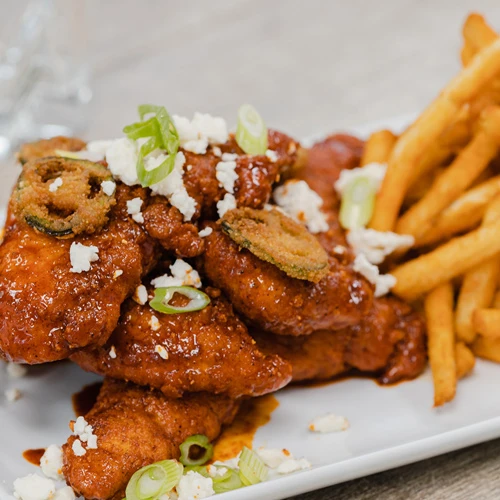 Hot Louisiana Chicken Tenders & Truffle Parmesan Fries