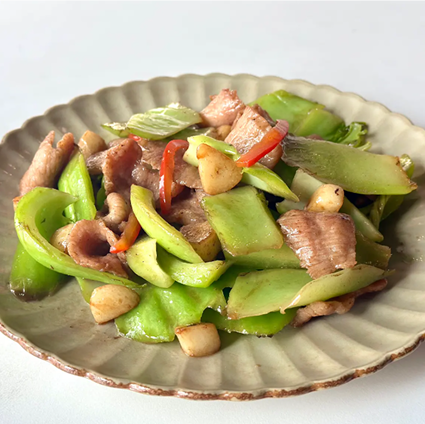 Pork Jowl with Mustard Greens and Golden Garlic