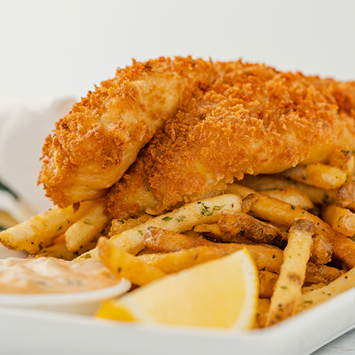 Poisson enrobé de pâte à la stout et frites aux truffes